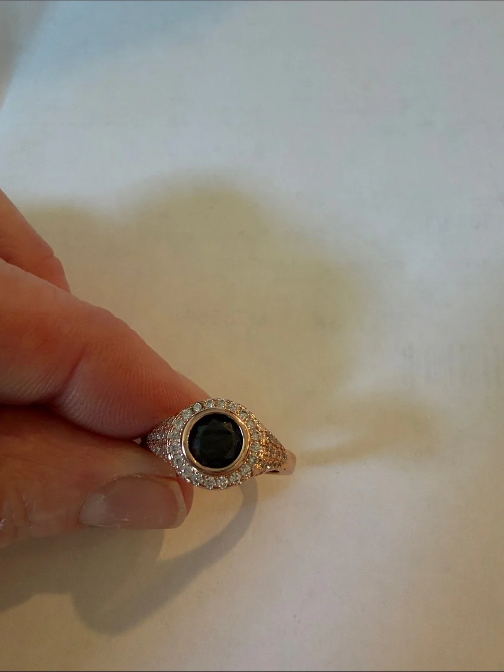 Rose Gold Ring with Black Center Stone and Pavé Accents